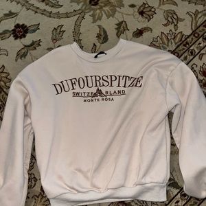 tan pullover fits tight